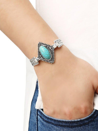 Oval Turquoise Set-in Carved Bracelet--Des Mess